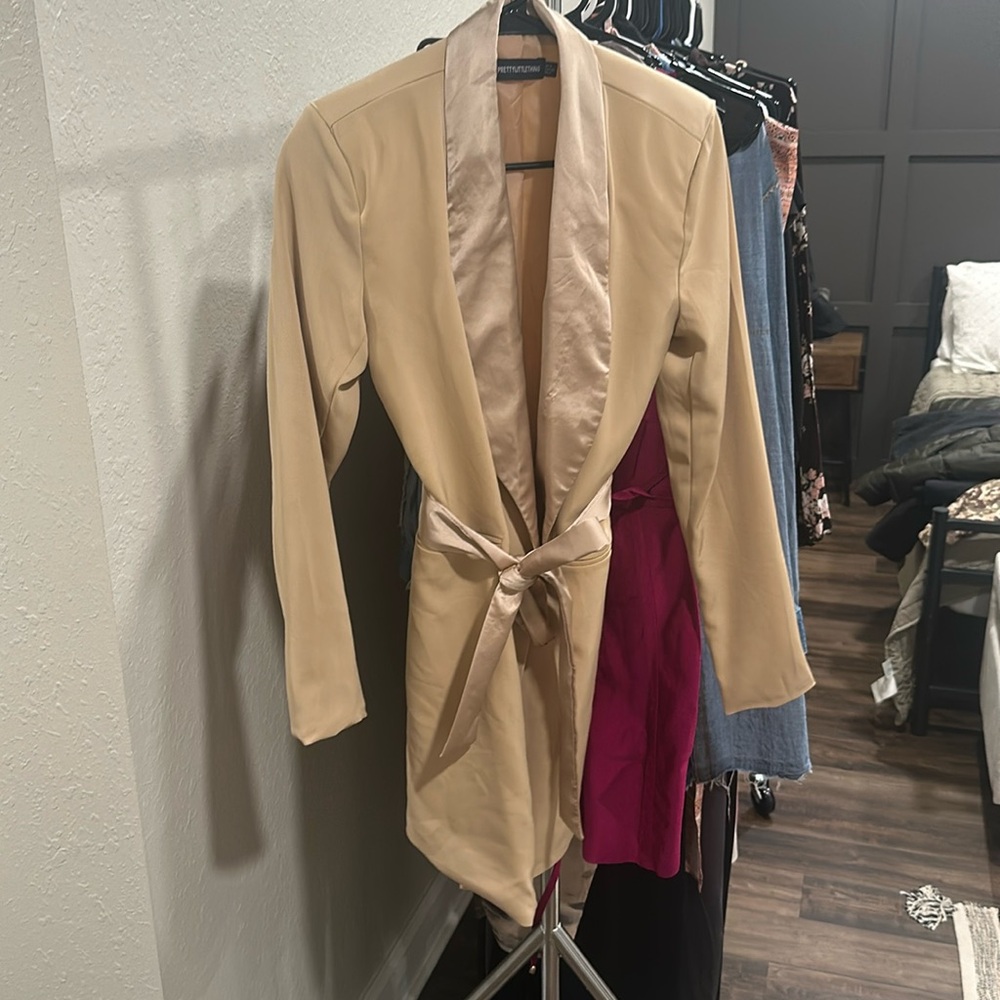 Women’s suit coat dress with tie